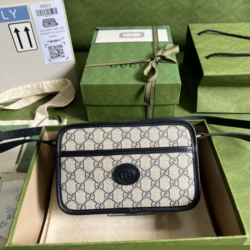 G*u*i clutch bags